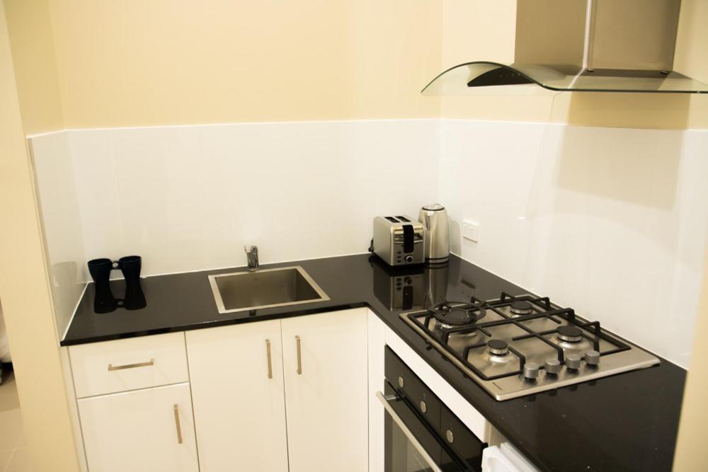 Отель T&M House Strathfield Экстерьер фото