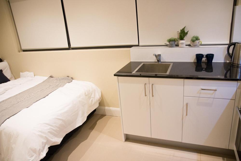 Отель T&M House Strathfield Экстерьер фото